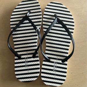 Black-and-white striped Old Navy flip-flops